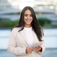 arabic businesswoman using mobile phone standing i 2025 03 18 19 02 31 utc 1